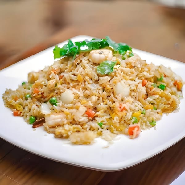 Basil & Mint's Vietnamese fried rice with shrimp, scallops, peas, carrots, and cilantro.